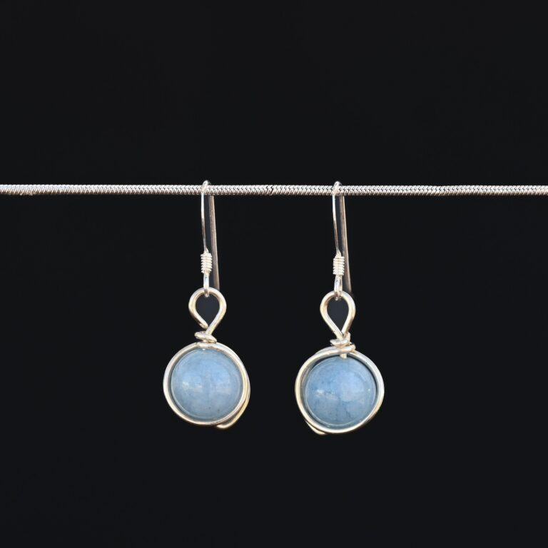 Aquamarine Quartz Wire Wrapped Earrings with silver wire wrap and ear wires.