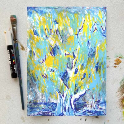 a glowing tree painted with white branches and trunk, yellow background and blue leaves