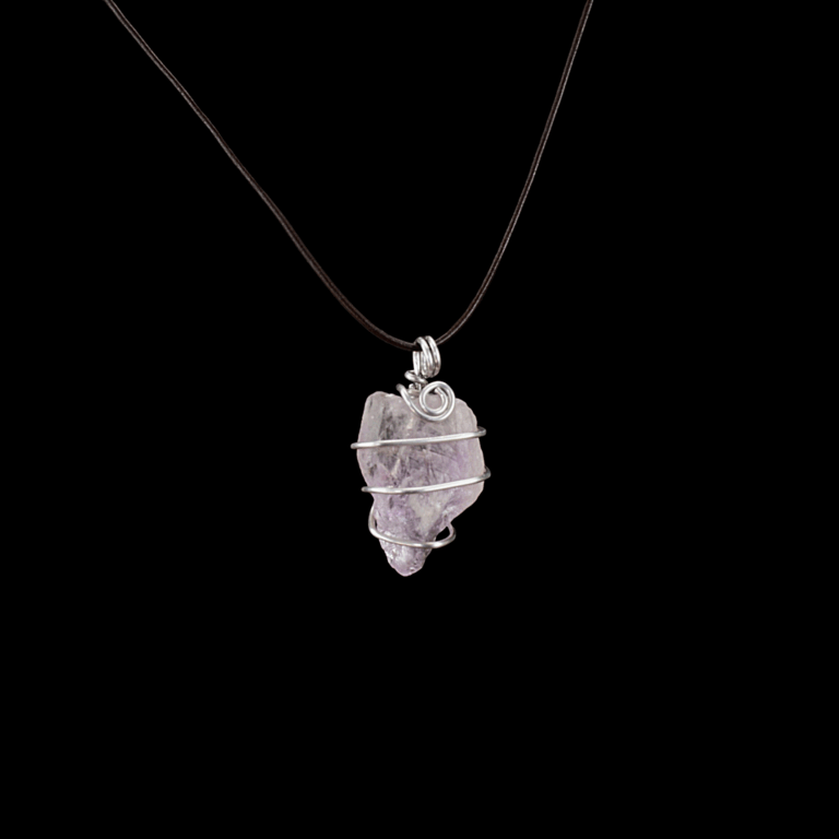 140 carat ametrine raw stone wrapped in hammered aluminum wire. This pendant is shown with a leather cord, but it is available with a silver chain if preferred.