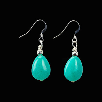 Green amazonite teardrop earrings with Sterling Silver French ear wires. These earrings are on a black background.