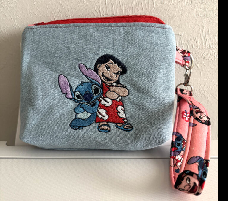 Lilo & Stitch wristlet w/red lining