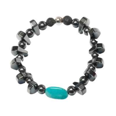 Hematite and turquoise stretch bracelet. This piece has both round and hematite flat chunk beads and is accented with one oval turquoise bead