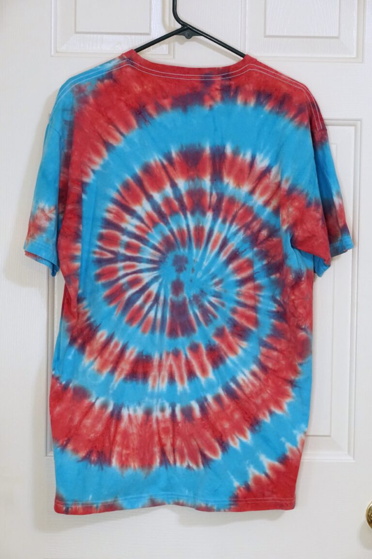 A red and blue tie-dye shirt in a spiral pattern. Extra Large.