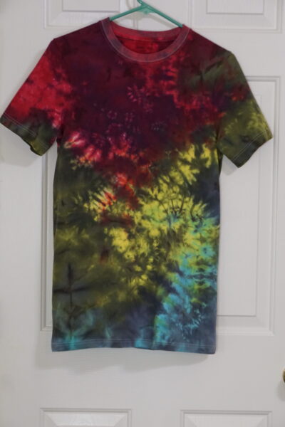 A red, yellow, blue, and black tie-dyed crew neck shirt. Crumple pattern, Small.