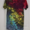 A red, yellow, blue, and black tie-dyed crew neck shirt. Crumple pattern, Small.