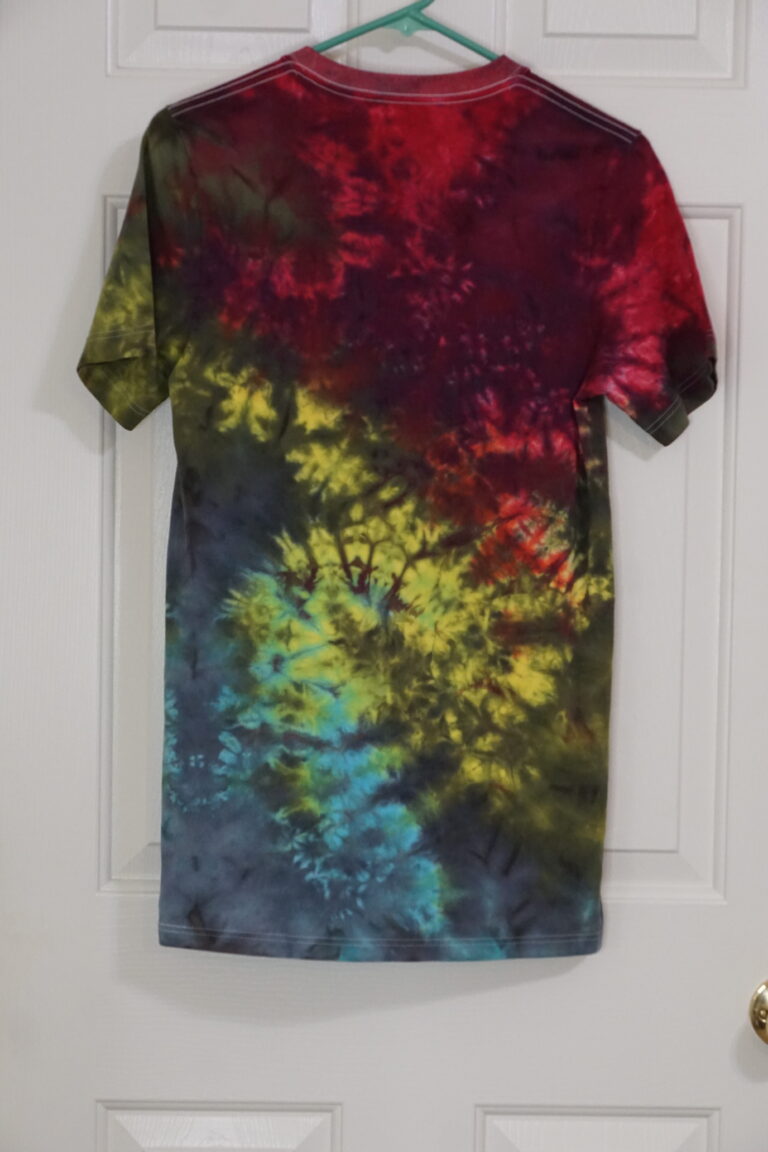 A red, yellow, blue, and black tie-dyed crew neck shirt. Crumple pattern, Small.