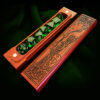 Exotic hardwood Ranger theme dice box displayed open showing a full set of dice and the magnetic closure.