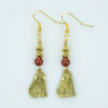 Gold cat earrings accented with a jasper bead. These have gold plated ear wires.