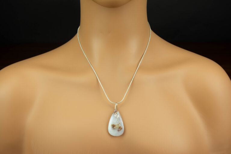 Pendant is shown on a mannequin.