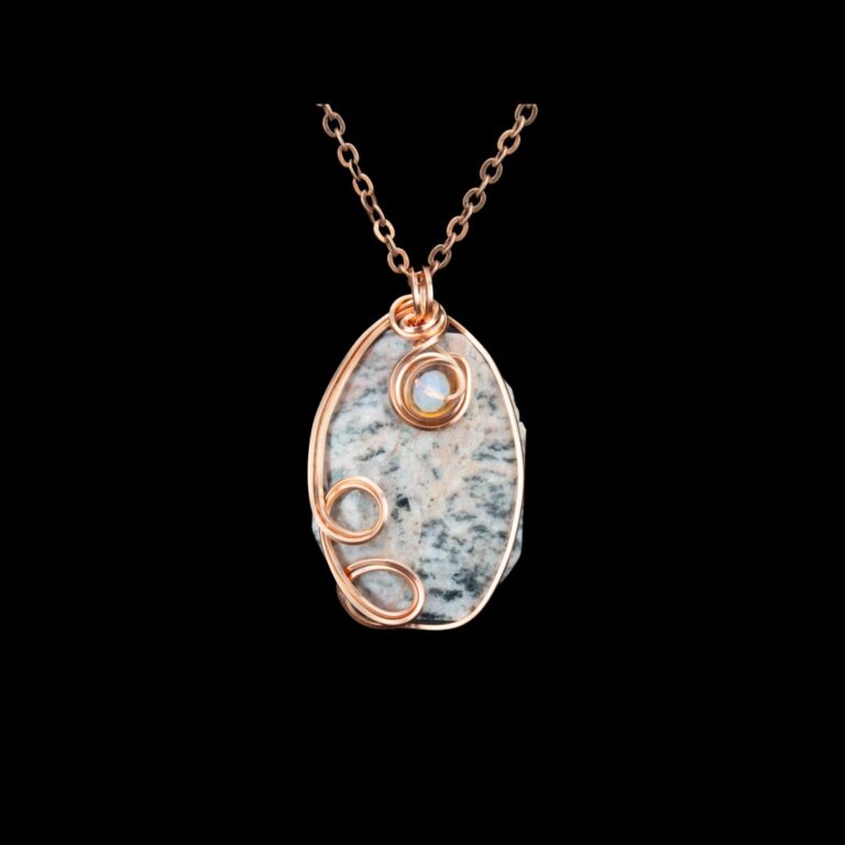 Copper wire wrapped Rhodonite pendant.