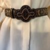 Brocade belt on model