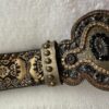 Brocade belt studs