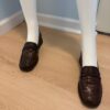 Brown loafers on model