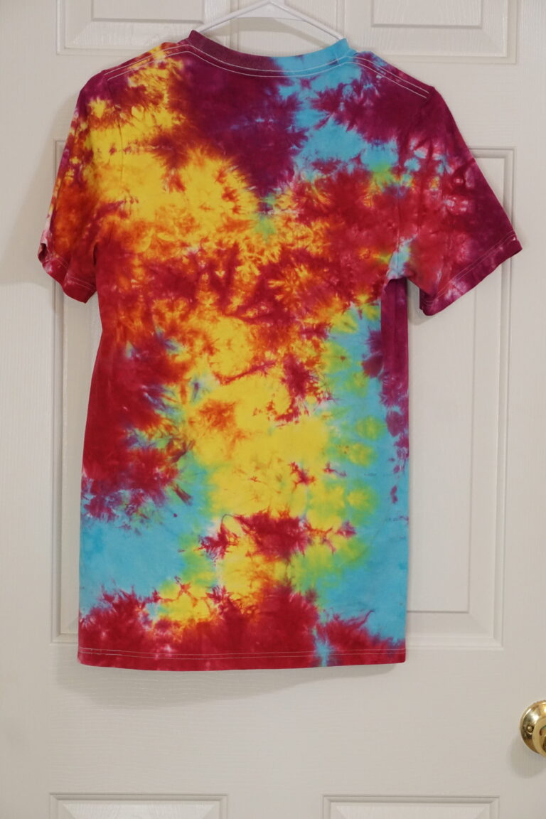 A red, yellow, blue, purple, and green tie-dyed crew neck shirt. Crumple pattern, Small.