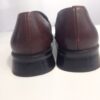 Brown loafers back view
