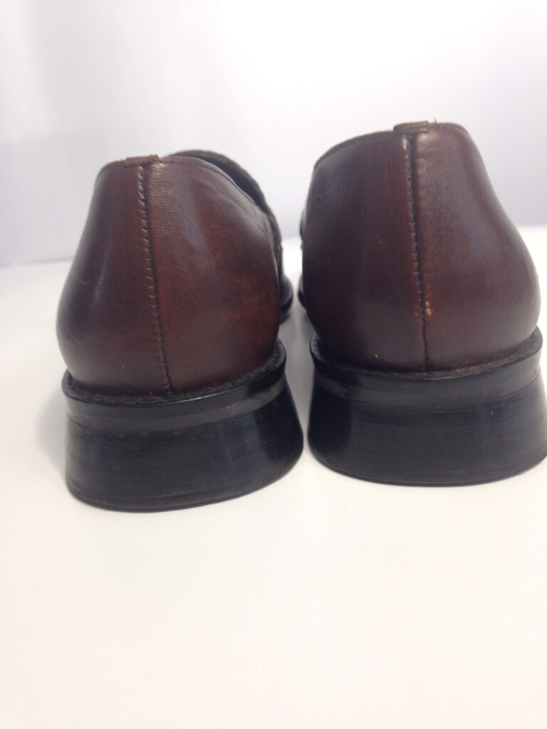 Brown loafers back view