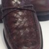 Brown loafers close up woven detail