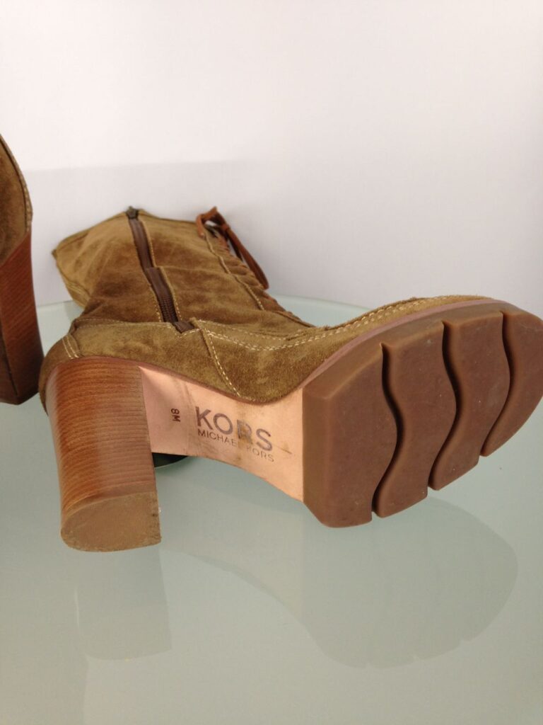 Tan Lace Up boots heel sole
