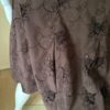 Brown skirt pattern close up