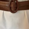 Bronze belt close up buckle