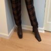 Brown boots on model front