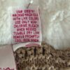 Tan Shrug tag