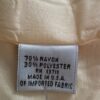 Yellow suit fabric tag