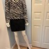 Black suede skirt zebra top black button flats model