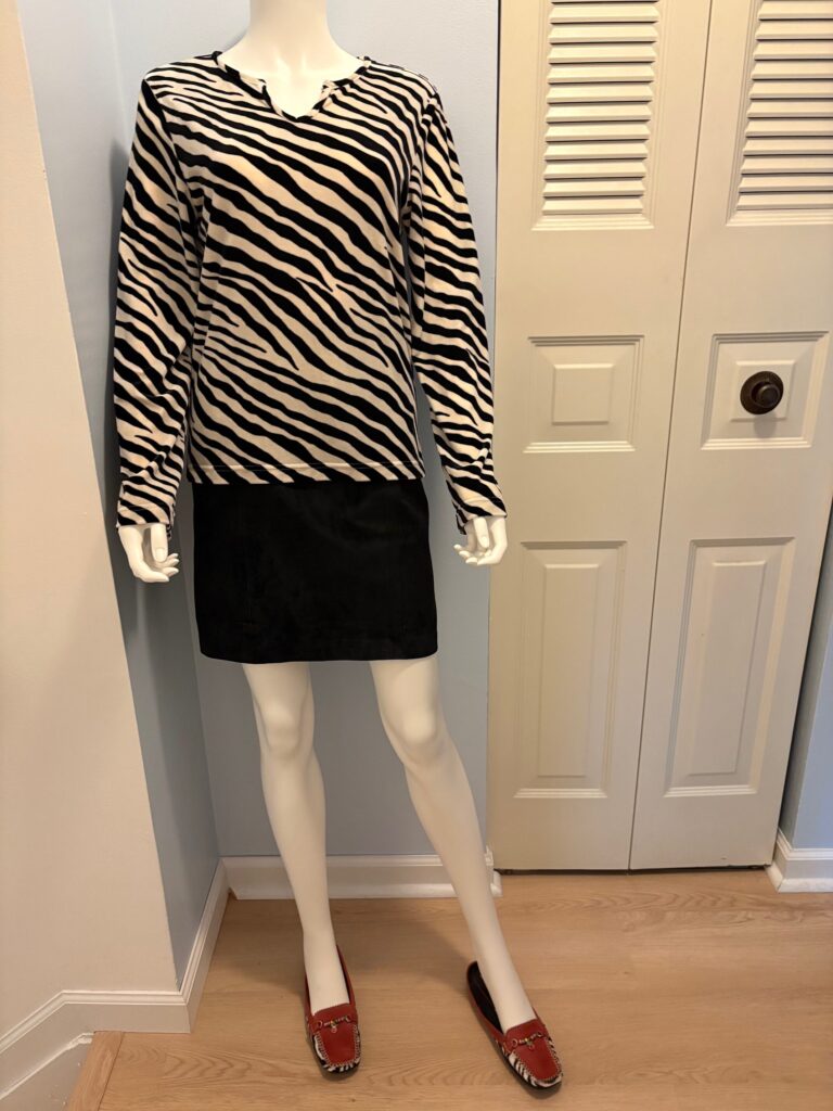 Zebra top suede skirt red mules on model