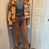 Justin boots on model with jeans, jacket and denim shirt