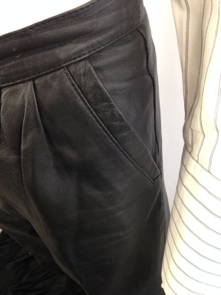 Leather pants slash pocket detail