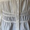 Kenar White blouse peplum waist close up