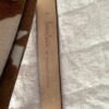 calf's belt side view