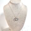 sterling silver flower wreath necklace on linen bust