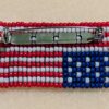 The back of the beaded distress flag pin.