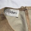 Tan suede top label