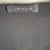 Black Asym top label