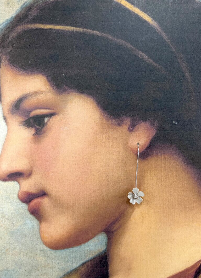 sterling silver dangle flower earring on model