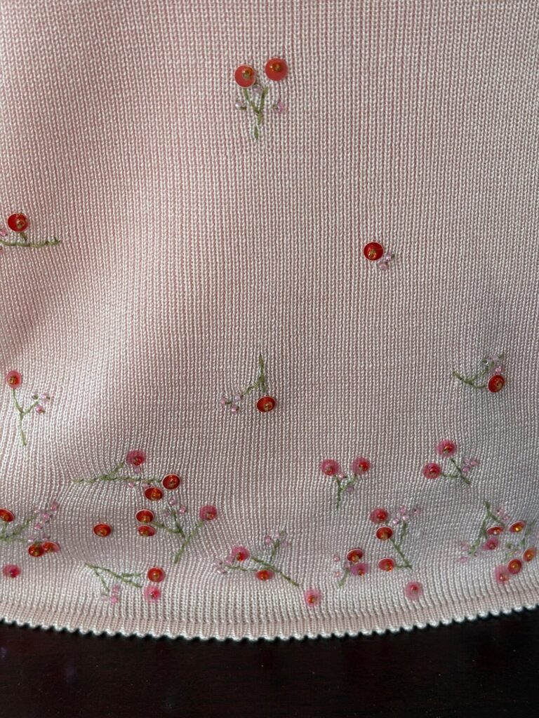 Pink Sweater set embroidery close up