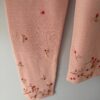 Pink Sweater set embroidery on sleeve close up