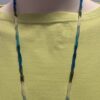 Blue lace strands green tee