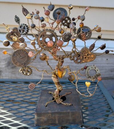 Wire tree made in a steampunk style. With brown, gold and coper colors.