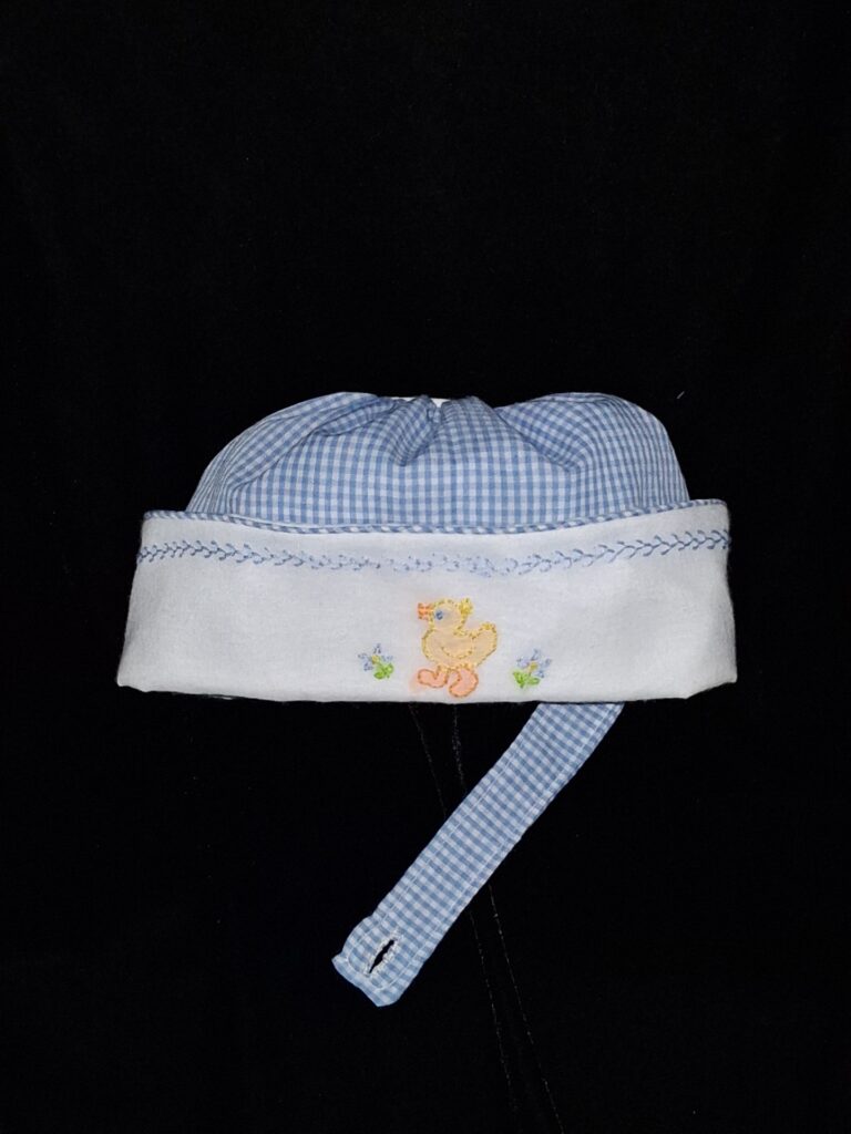 b724fd9e 8ba3 4d89 879c 0ca8ce114d1aButtonhole ducky hat
