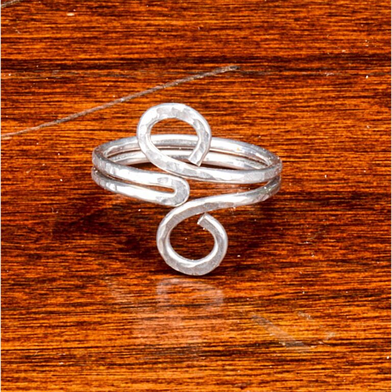 Hammered Aluminum Ring on wood table