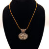 Photo of Vibrant Spirit Wire Wrapped Crazy Lace Agate Tree of Life Pendant on a necklace display