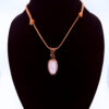 Photo of Pure Energy Wire Wrapped Quartz Necklace on a neck form