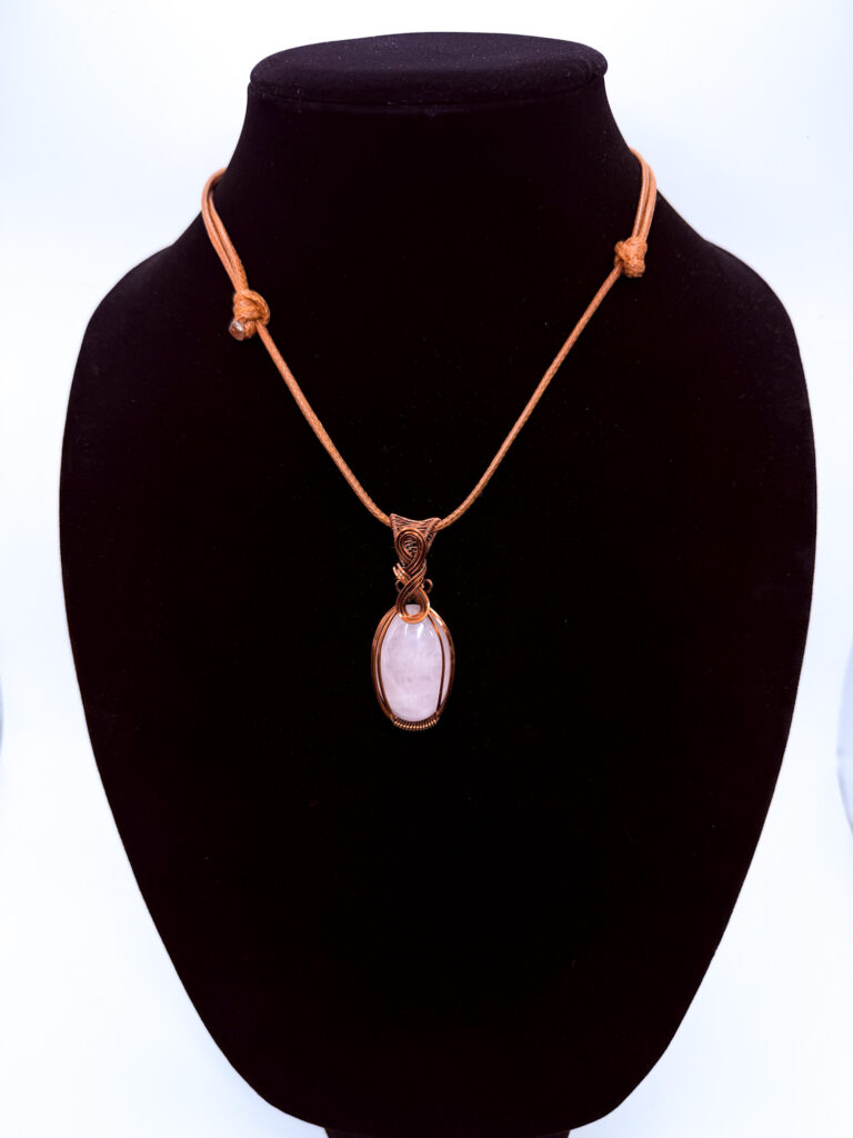 Pure Energy Wire Wrapped Snow Quartz Necklace 6 Photo of Pure Energy Wire Wrapped Quartz Necklace on a neck form