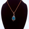 Photo of Serene Tides Wire Wrapped Chrysocolla Necklace on a neck form