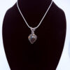 Photo of Divine Heart Wire Wrapped Labradorite Pendant on a neck form