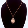 Photo of Peaceful Spirit Wire Wrapped Plume Agate Necklace on a neck form